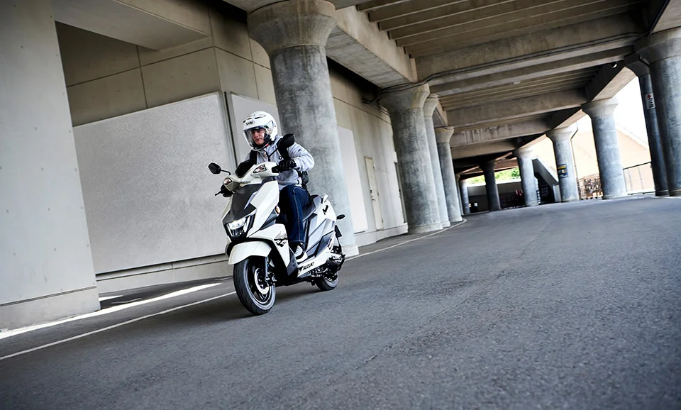 Suzuki Avenis 125 White On Road Zoom Out