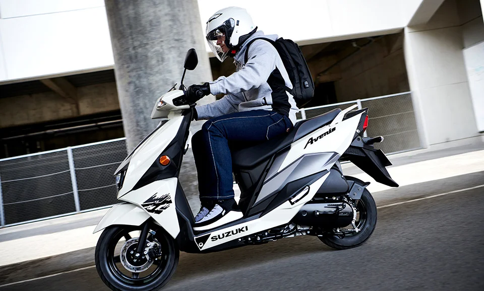 People Ride Suzuki Avenis 125 White Left Side